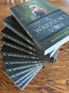 Curving stack of books, entitled A Warrior's Vow